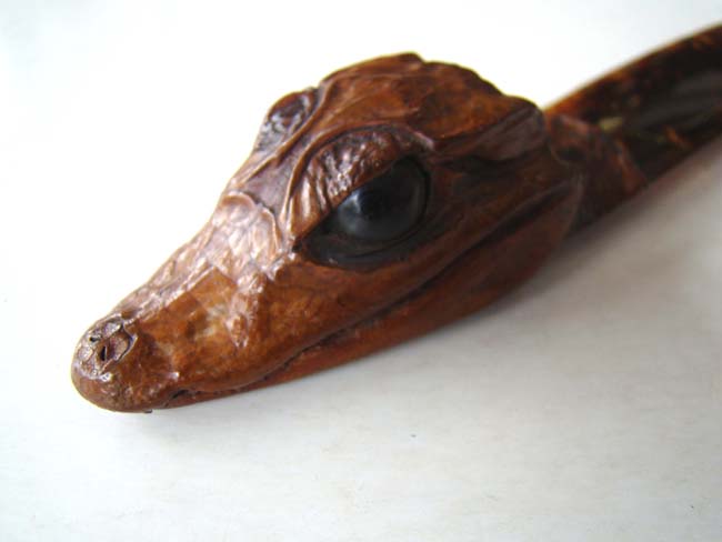 A wonderful Victorian tortoiseshell letter opener mounted with the head of a baby alligator